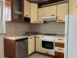 Η κουζίνα ή μικρή κουζίνα στο Apartma DaPDa