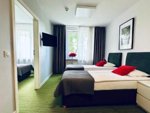 Posteľ alebo postele v izbe v ubytovaní B&B Julinek Park