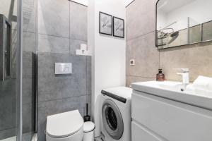 Kúpeľňa v ubytovaní Grand Apartments - Apartament Aqua 3 - Rezydencja Marina Gdańsk