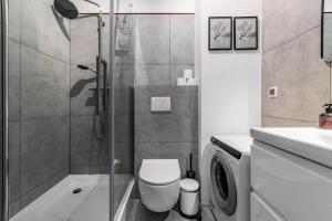 Kúpeľňa v ubytovaní Grand Apartments - Apartament Aqua 3 - Rezydencja Marina Gdańsk + 2 fotografie