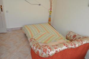 Postel nebo postele na pokoji v ubytování Nena City Center Apartment