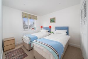 Postel nebo postele na pokoji v ubytování Stylish flat between London Bridge & Tower Bridge