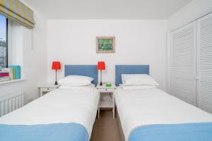 Postel nebo postele na pokoji v ubytování Stylish flat between London Bridge & Tower Bridge