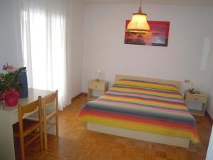 Postel nebo postele na pokoji v ubytování Miramonti Hotel
