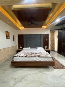 A bed or beds in a room at Anand residency