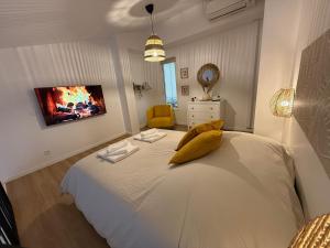 Ένα ή περισσότερα κρεβάτια σε δωμάτιο στο Superbe F2 Duplex Proche Paris & Disneyland