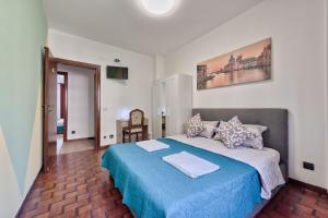 Postel nebo postele na pokoji v ubytování Bellavista Palladio