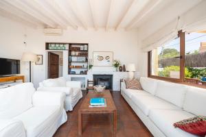 A television and/or entertainment centre at Casa Morant on the promenade MHM