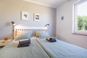 Postel nebo postele na pokoji v ubytování Apartman 6 + 2