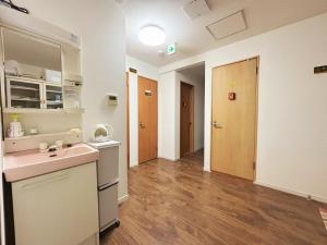 Η κουζίνα ή μικρή κουζίνα στο 花の郷田端b01