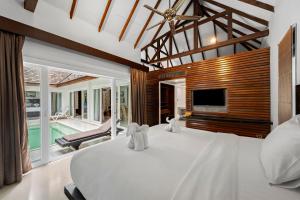 TV a/nebo společenská místnost v ubytování Zara Beach Resort Koh Samui