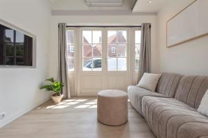 Ein Sitzbereich in der Unterkunft Flamingo Beach Apartments