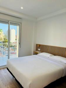 Postel nebo postele na pokoji v ubytování Apartamento en Playa de Gandia