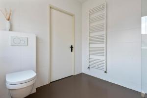 Ein Badezimmer in der Unterkunft Flamingo Beach Apartments