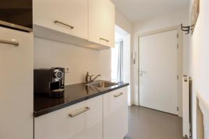 Küche/Küchenzeile in der Unterkunft Flamingo Beach Apartments