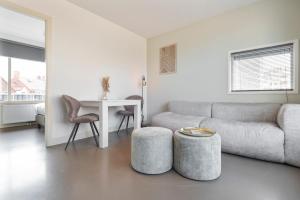 Ein Sitzbereich in der Unterkunft Flamingo Beach Apartments