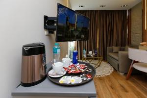 Kohvi ja tee valmistamise võimalus majutusasutuses Pyramids moon Tower