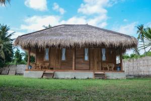 Ein Garten an der Unterkunft Beranda Ecolodge