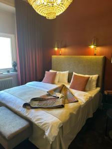 Postel nebo postele na pokoji v ubytování Hotell Onyxen, boutique- & lifestyle, Adults Only