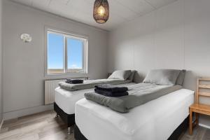 Voodi või voodid majutusasutuse Ocean Break Cabins toas