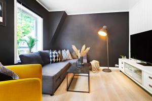 Posezení v ubytování Townhouse with free parking in the city centre - 4 bedrooms