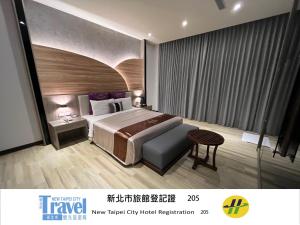 Letto o letti in una camera di Purple Rainbow Motel
