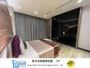 Letto o letti in una camera di Purple Rainbow Motel