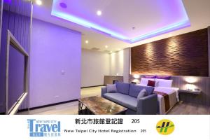 Area soggiorno di Purple Rainbow Motel