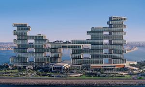 an aerial view of a large building next to the water at Atlantis The Royal in Dubai