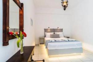 Postel nebo postele na pokoji v ubytování HOTEL Dolphin