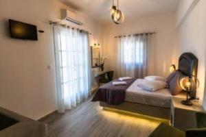 Postel nebo postele na pokoji v ubytování HOTEL Dolphin