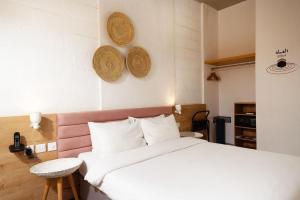Postel nebo postele na pokoji v ubytování Dara Al Yammamah Hotel - Formerly Nuzl Shada + 35 fotografií