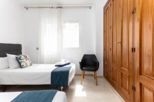 Ein Bett oder Betten in einem Zimmer der Unterkunft MTR - Marbella Temporary Rent Two Bedrooms Apartment Av del Mar