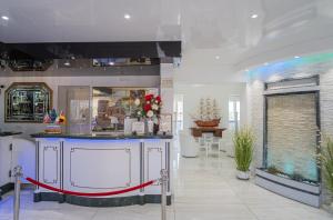 a large room with a large aquarium in it at Hotel Ristorante Borgo La Tana in Maratea