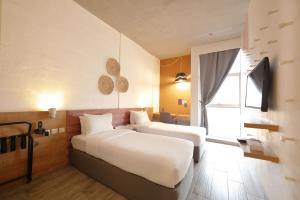 Postel nebo postele na pokoji v ubytování Dara Al Yammamah Hotel - Formerly Nuzl Shada