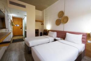 Postel nebo postele na pokoji v ubytování Dara Al Yammamah Hotel - Formerly Nuzl Shada