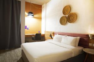 Postel nebo postele na pokoji v ubytování Dara Al Yammamah Hotel - Formerly Nuzl Shada