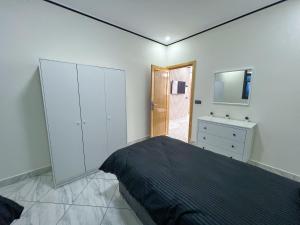 Postel nebo postele na pokoji v ubytování Appartement Alhoceima