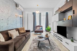 Et tv og/eller underholdning på Divin Apartments Beach Resort