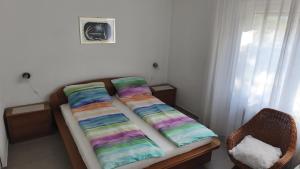 a bed in a room with at Sobe Godina in Materija