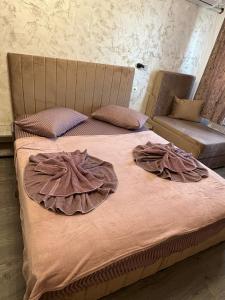 Postel nebo postele na pokoji v ubytování AmA