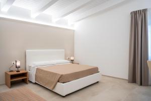 Ένα ή περισσότερα κρεβάτια σε δωμάτιο στο B&B Papanonno - Relax vicino Palinuro +14 φωτογραφίες
