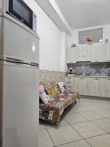 Kuchyň nebo kuchyňský kout v ubytování Clary Home Cefalu'