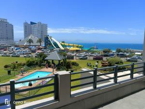 a view of a amusement park with a roller coaster at Diaz De Valle 35 in Mossel Bay