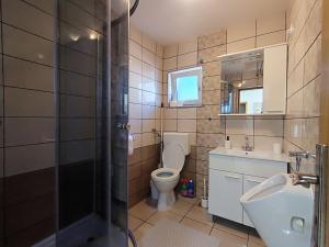 Koupelna v ubytování Apartments Jolić + 37 fotografií