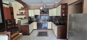 Kuchyňa alebo kuchynka v ubytovaní Apartamenty Szkocka