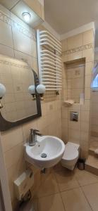 Kúpeľňa v ubytovaní Apartamenty Szkocka