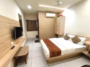 TV a/nebo společenská místnost v ubytování Hotel Kinara + 23 fotografií