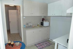 Η κουζίνα ή μικρή κουζίνα στο Marianne's Apartment