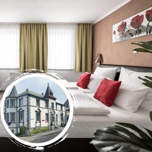 Postel nebo postele na pokoji v ubytování Le petit Palais - Hotel/Pension